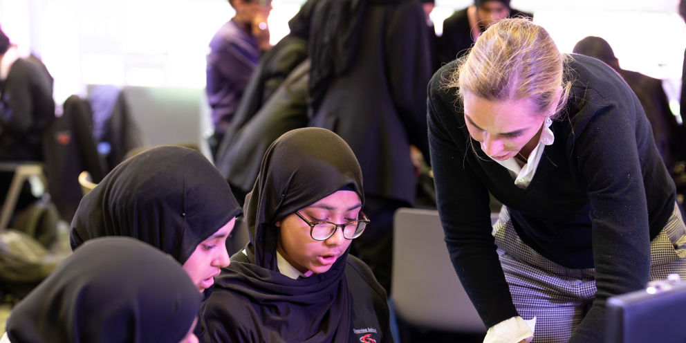 CEO Retail Banking Solange Chamberlain at a NatWest Thrive event with students from an East London school, doing a NatWest Thrive activity 