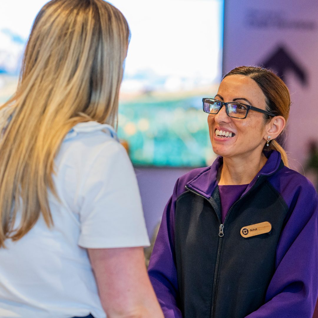 This image shows two women. The one on the right is a Royal Bank of Scotland colleague and she’s is facing the other woman and talking. 