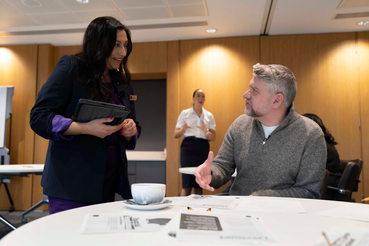 This image shows NatWest colleague with a customer