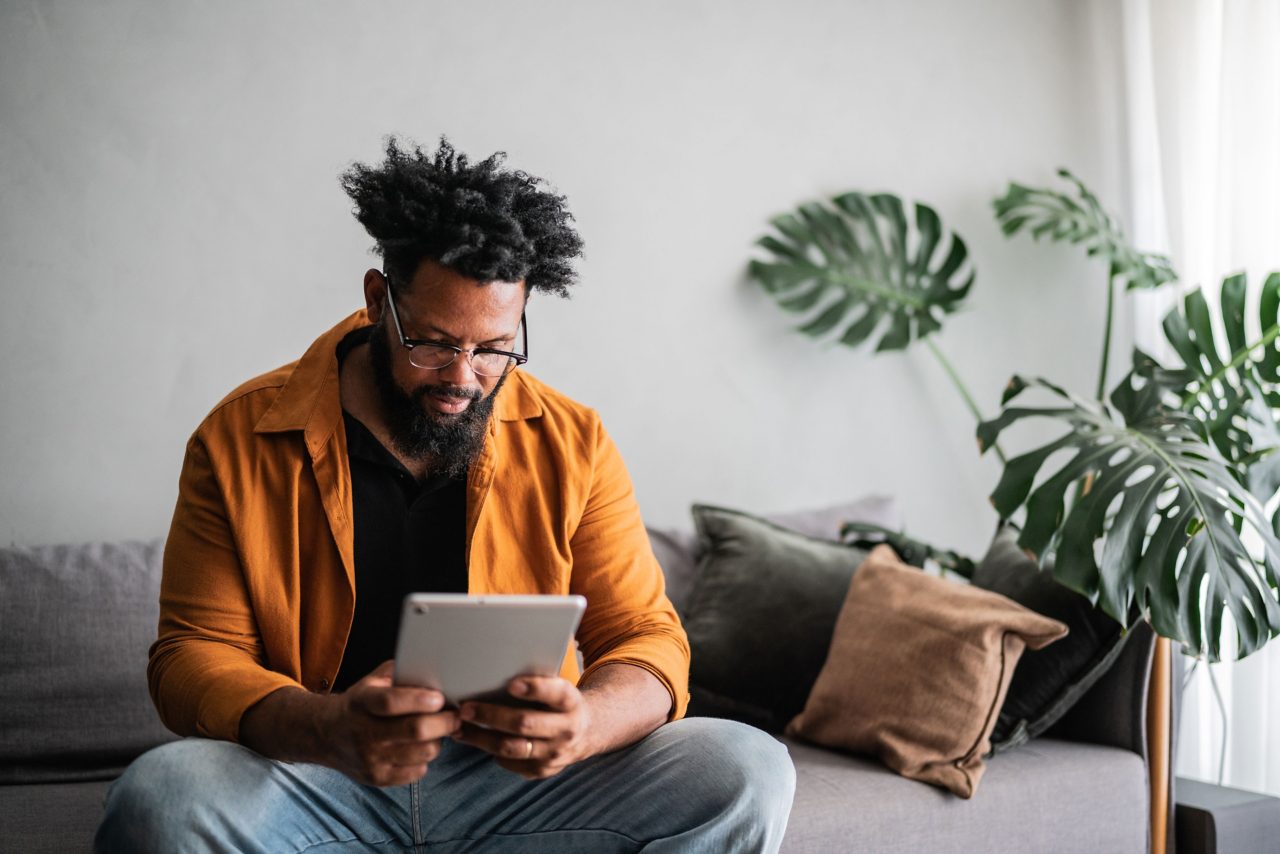 Man looking at an ipad